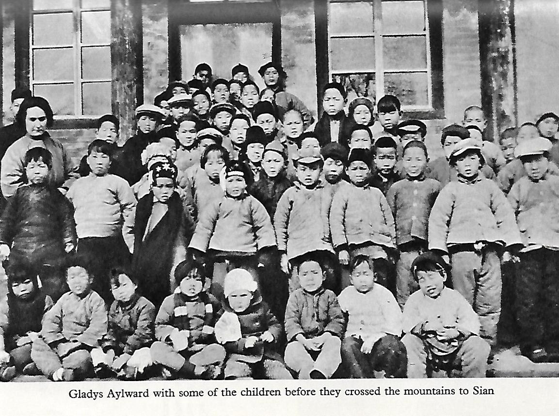 Gladys Aylward with her children before crossing the mountains